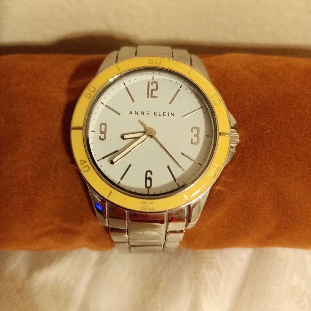 Anne Klein white face outer yellow/ tan second silver tone women's watch